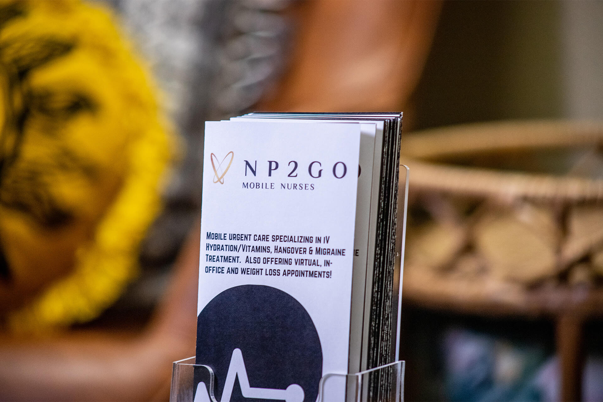 A stack of NP2GO business cards.