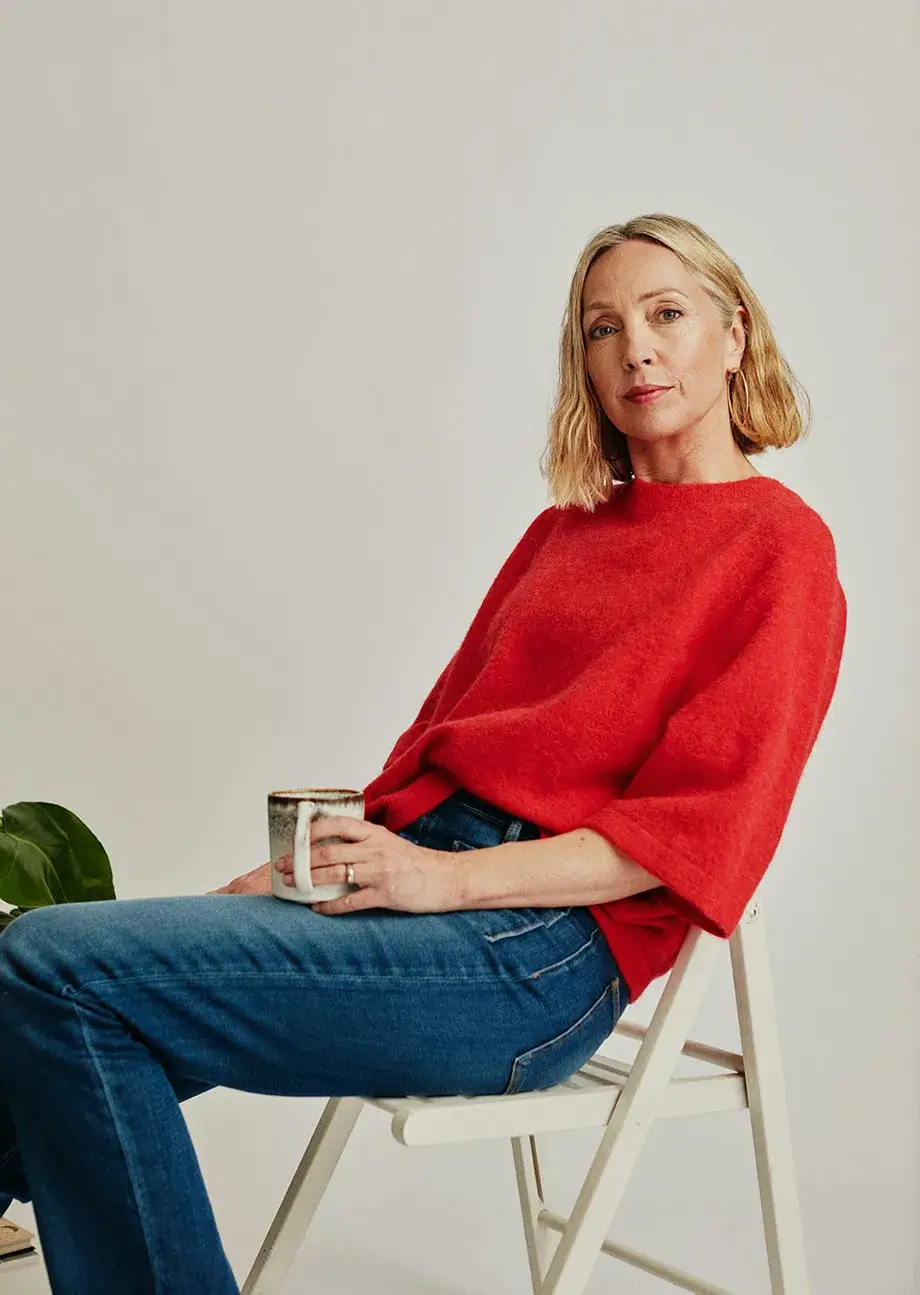 Woman sitting inside