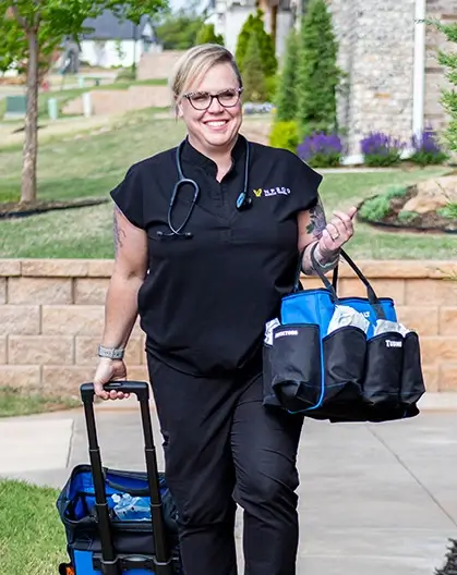 NP2GO-mobile-nurse An NP2GO mobile nurse arriving at a house